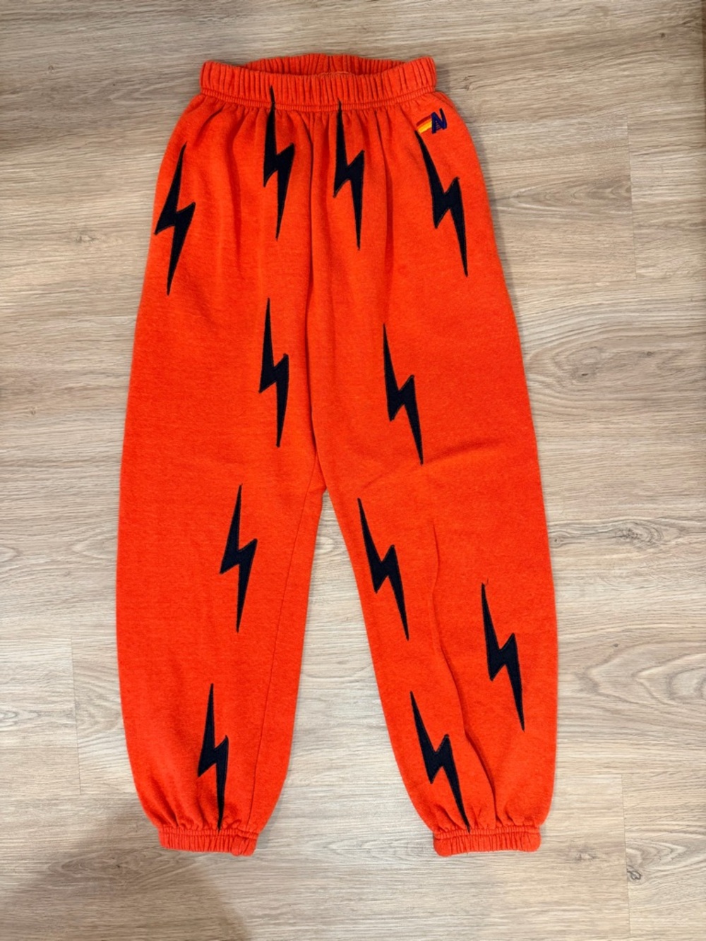 Aviator Nation Orange Joggers with Black Lightning Bolts